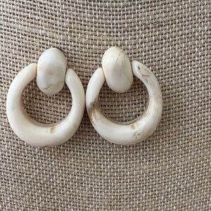 White marble like hoop earrings with a boho vibe.